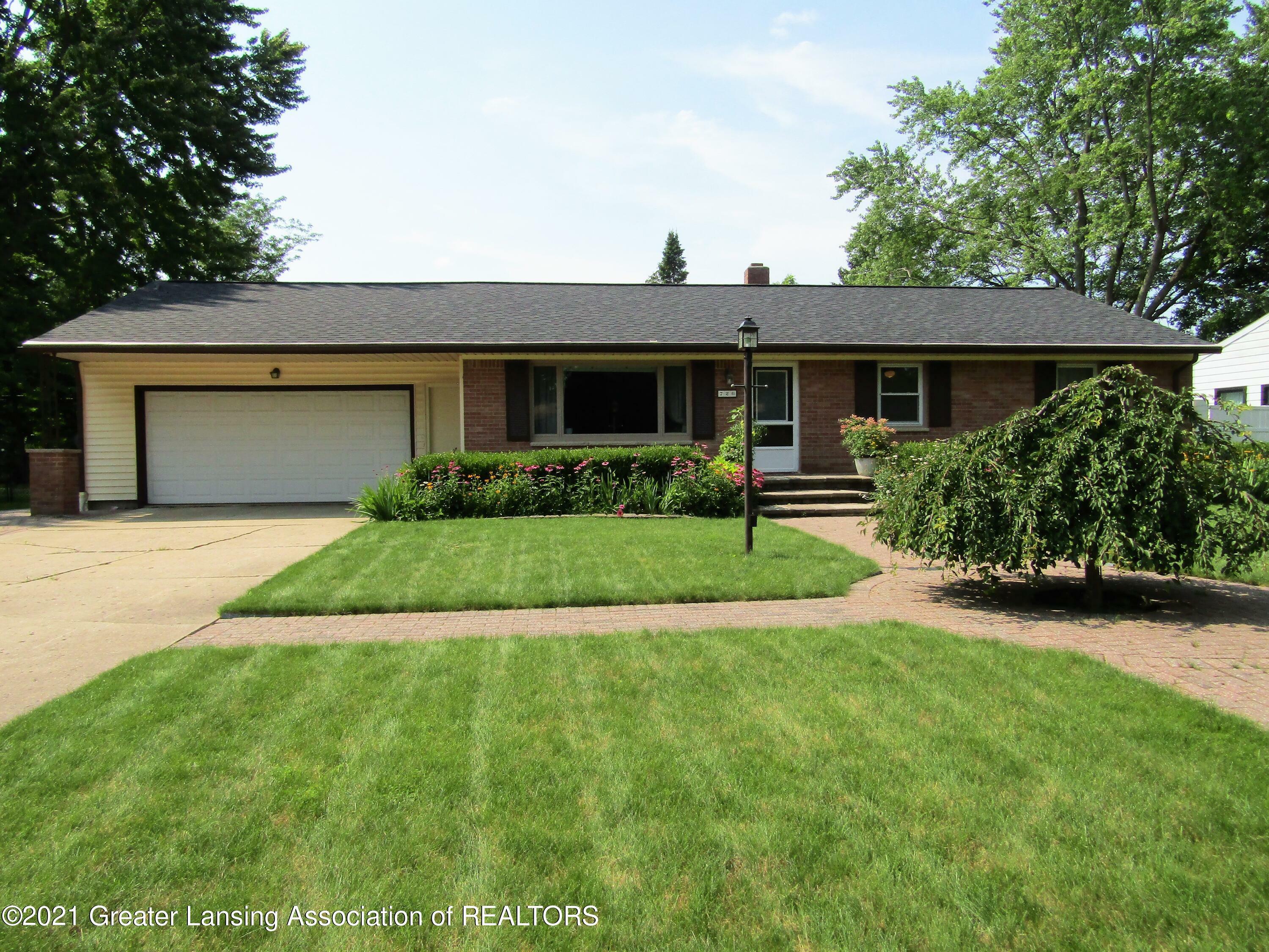 Property Photo:  726 Quinlan Drive  MI 48895 