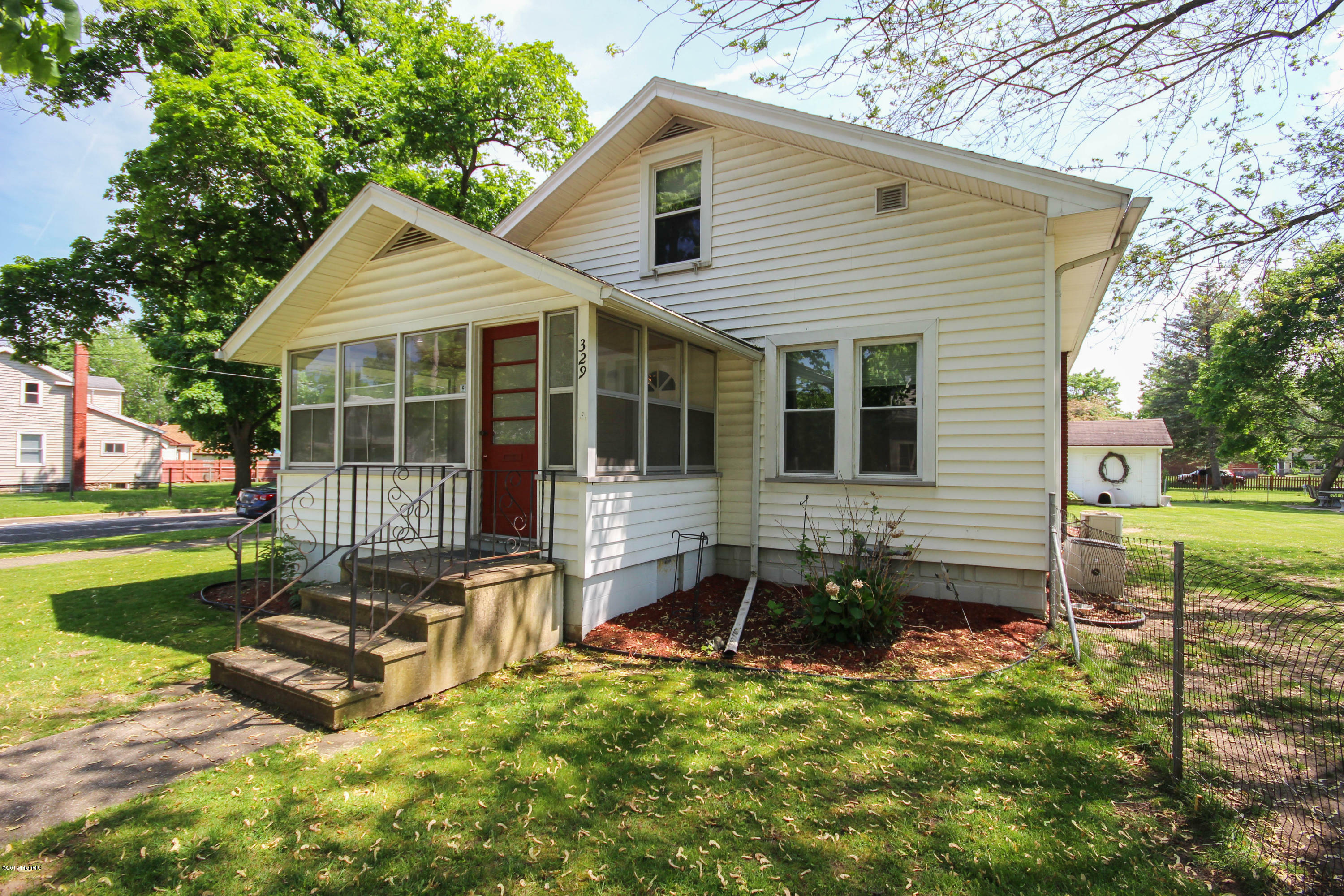 Property Photo:  329 Sixth Avenue  MI 49093 