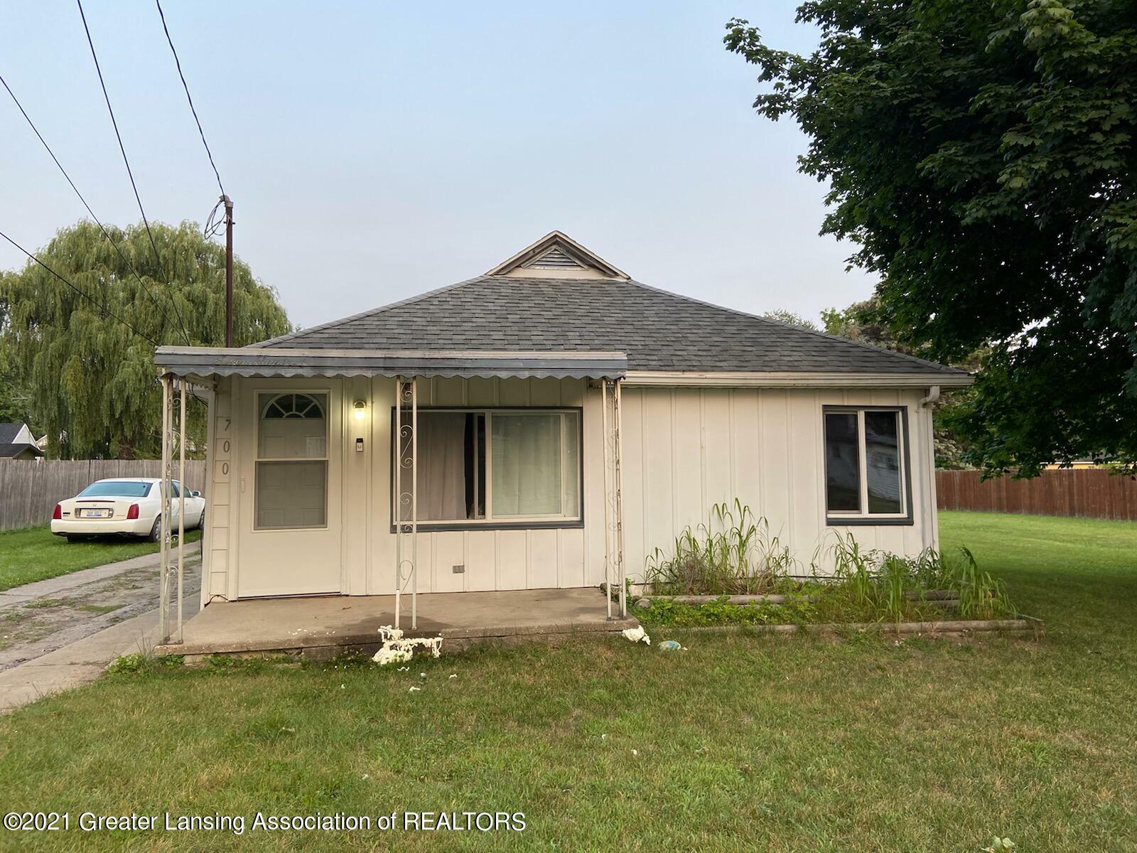 Property Photo:  700 Frazier Avenue  MI 48867 