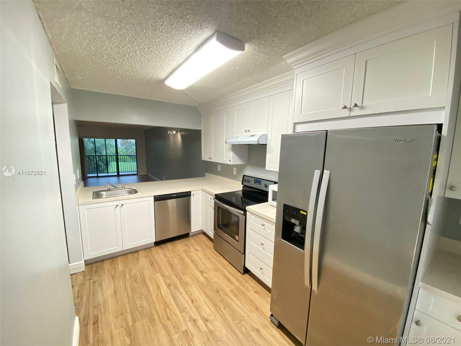 Property Photo:  1200 NW 80 Ave 202A  FL 33063 
