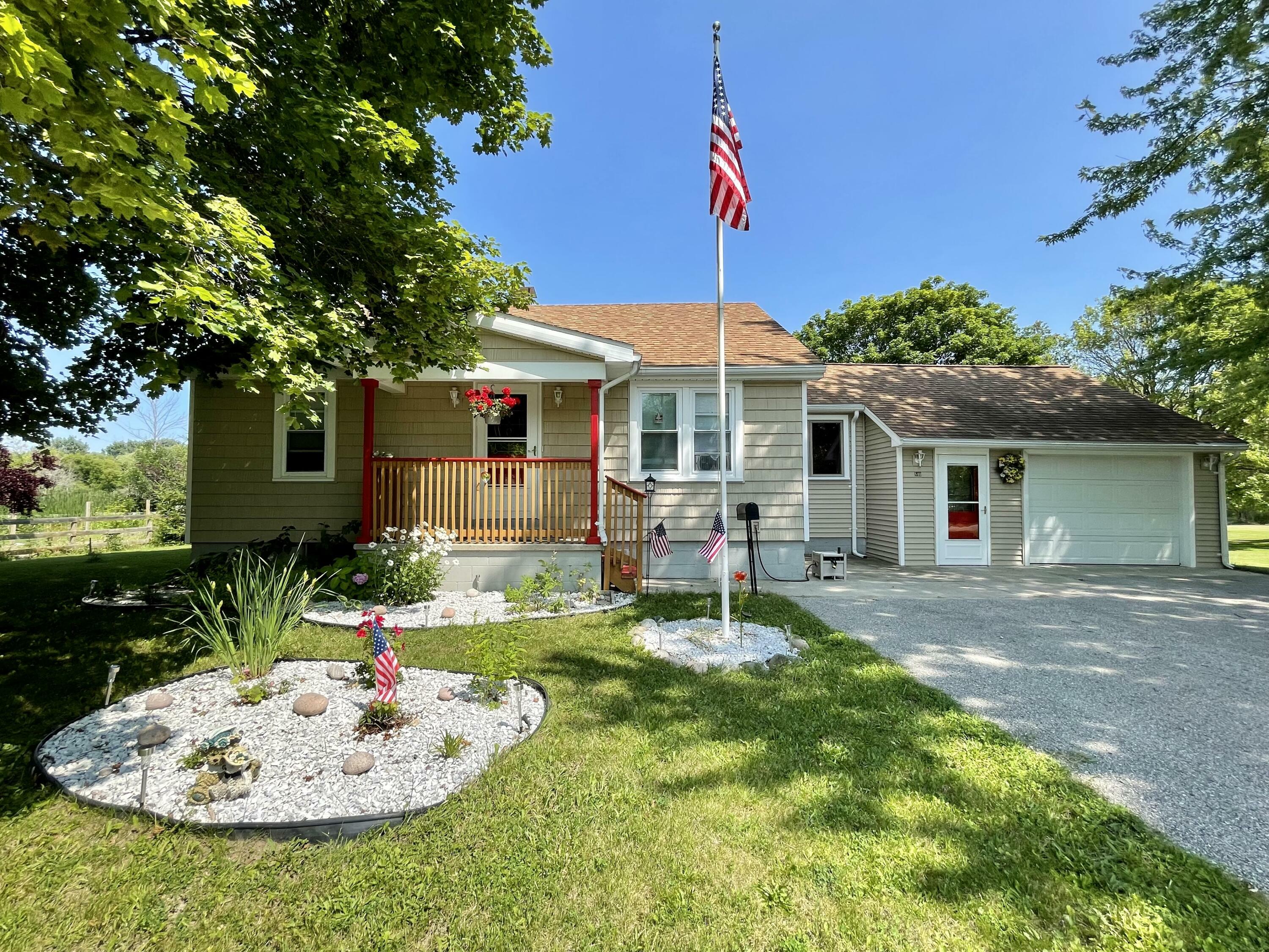 Property Photo:  840 Dresser Street  MI 49721 