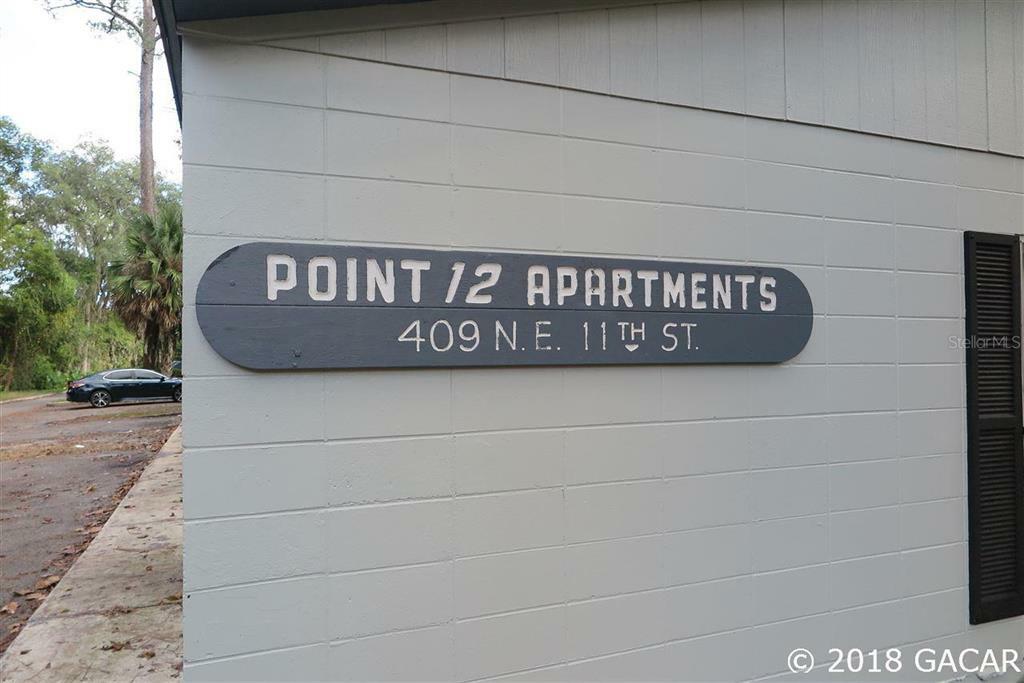 Property Photo:  409 NE 11th Street 1-14  FL 32601 