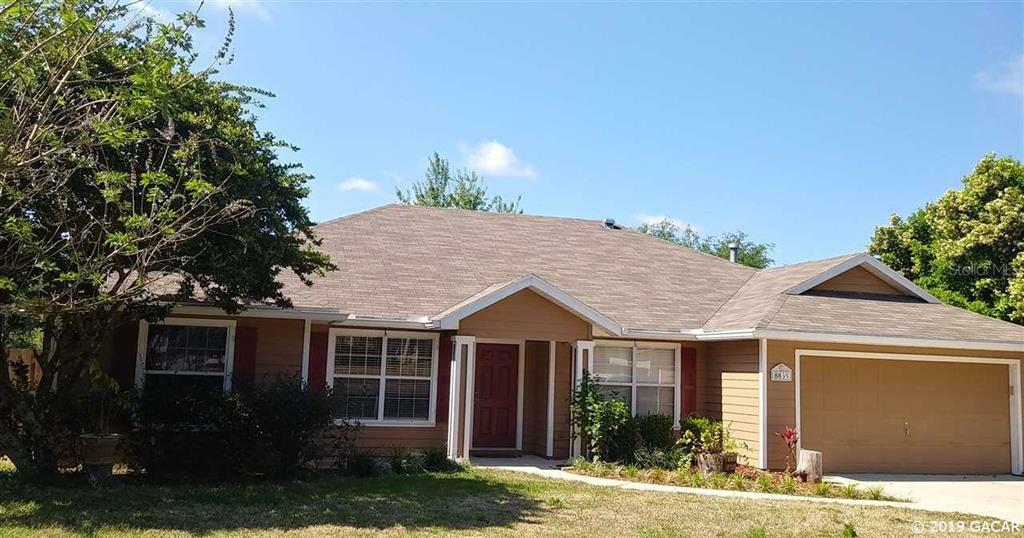 Property Photo:  8835 NW 11 Place  FL 32606 