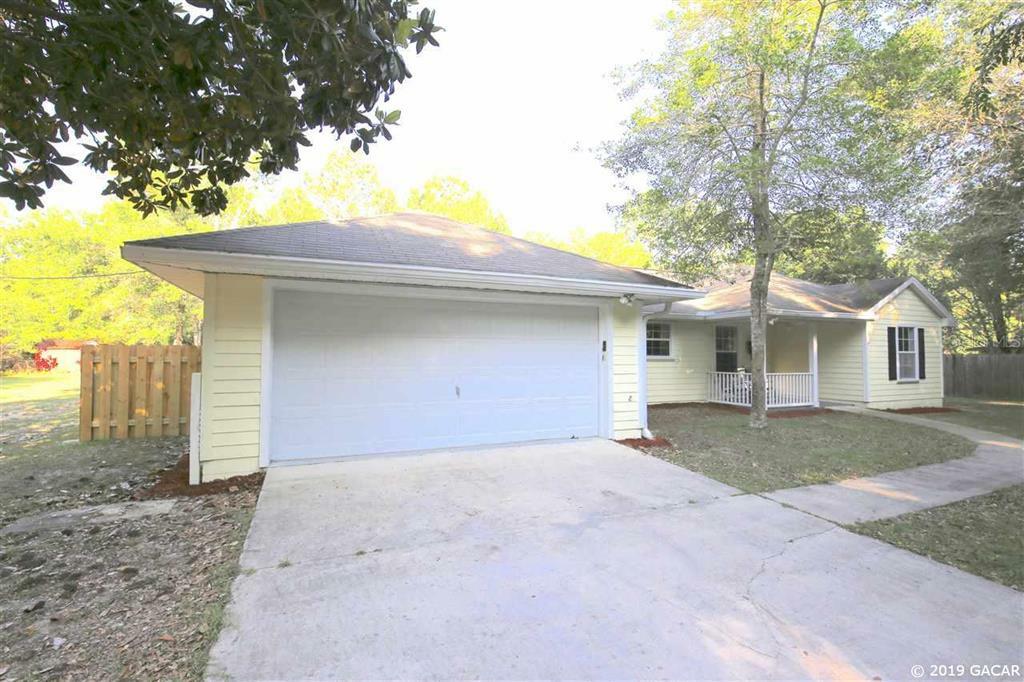 Property Photo:  9727 SW 122nd Street  FL 32608 