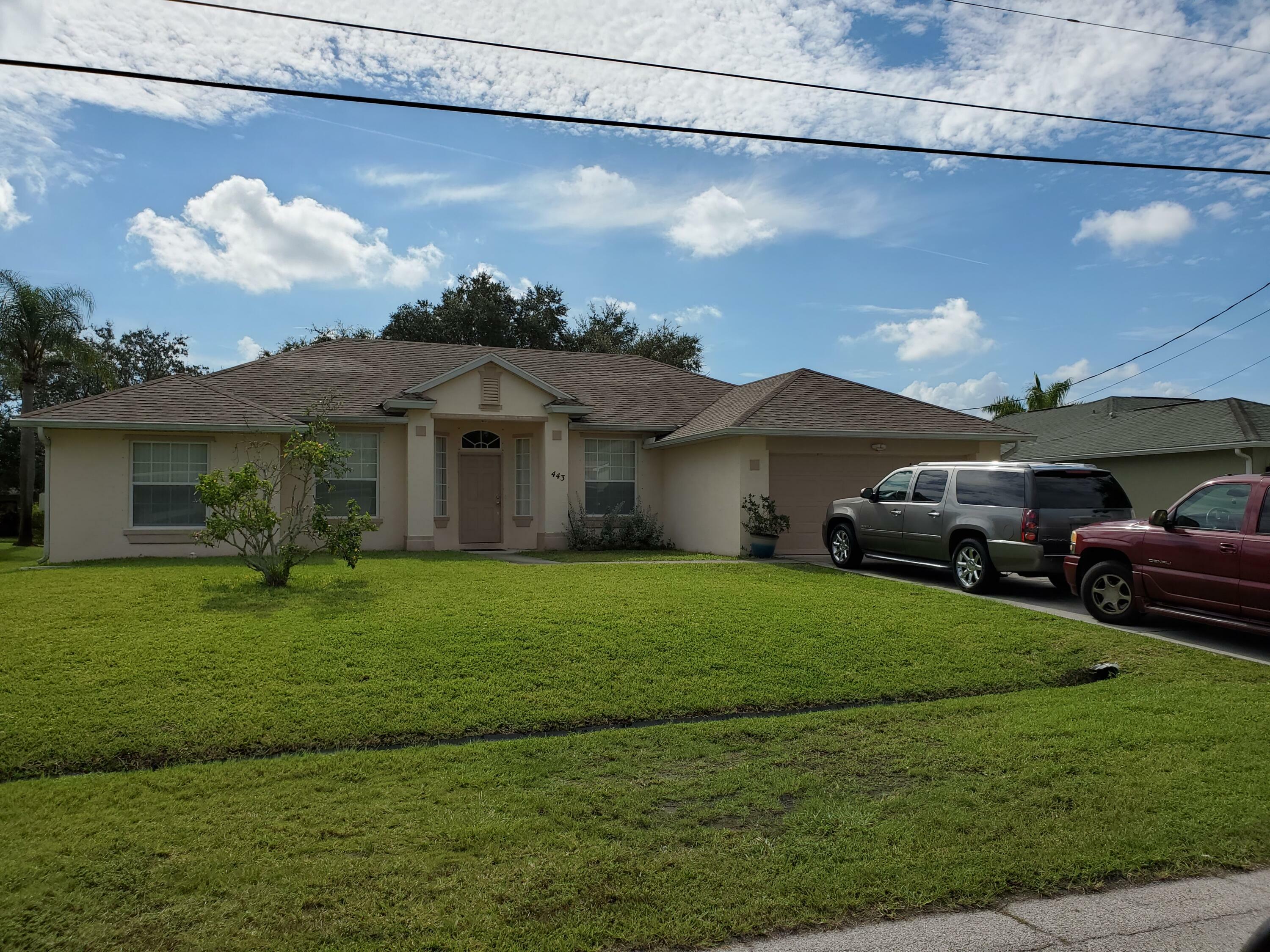 Property Photo:  443 SE Cork Road  FL 34984 