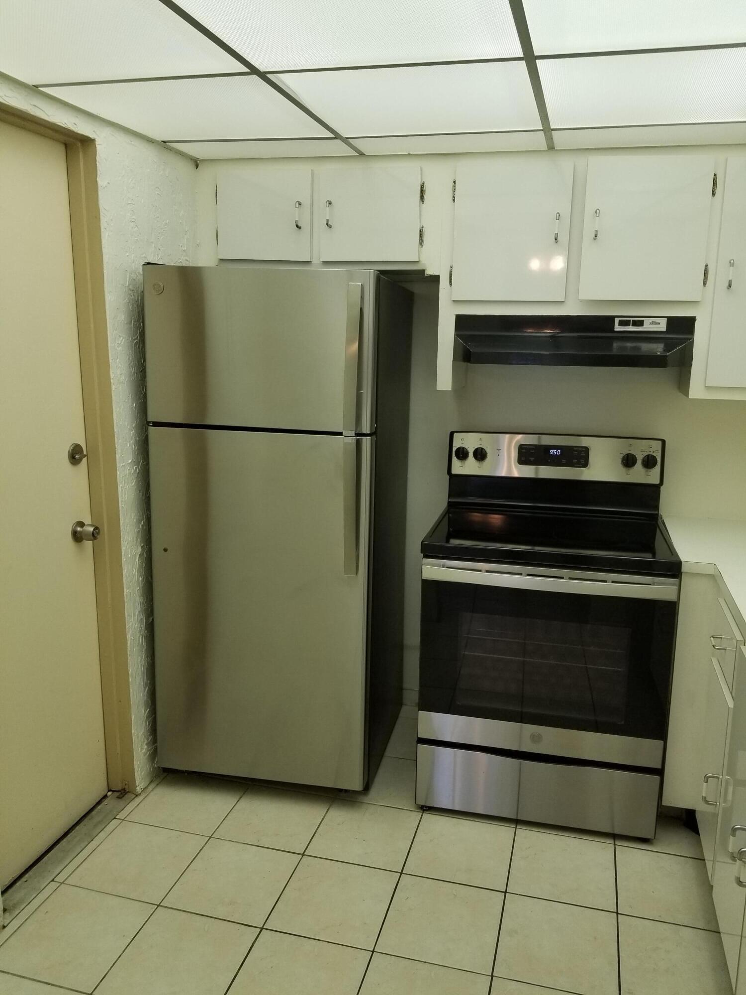 Property Photo: 632 NW 13th Street 28 FL 33486