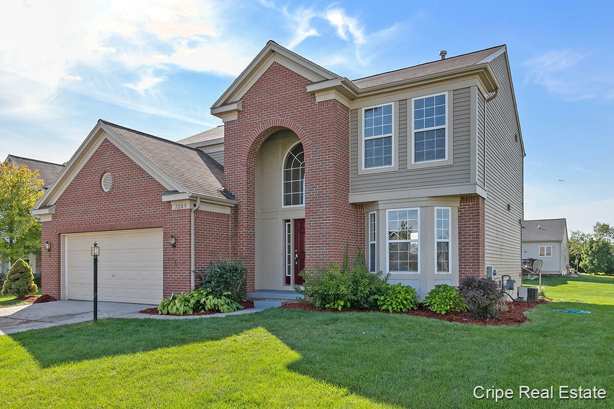 Property Photo:  7205 Meadowgrass Court SE  MI 49316 