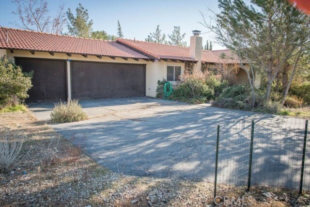 Property Photo:  8899 Camphor Avenue  CA 92345 