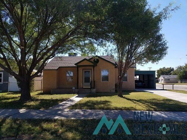 Property Photo:  1211 W Chisum Ave  NM 88210 