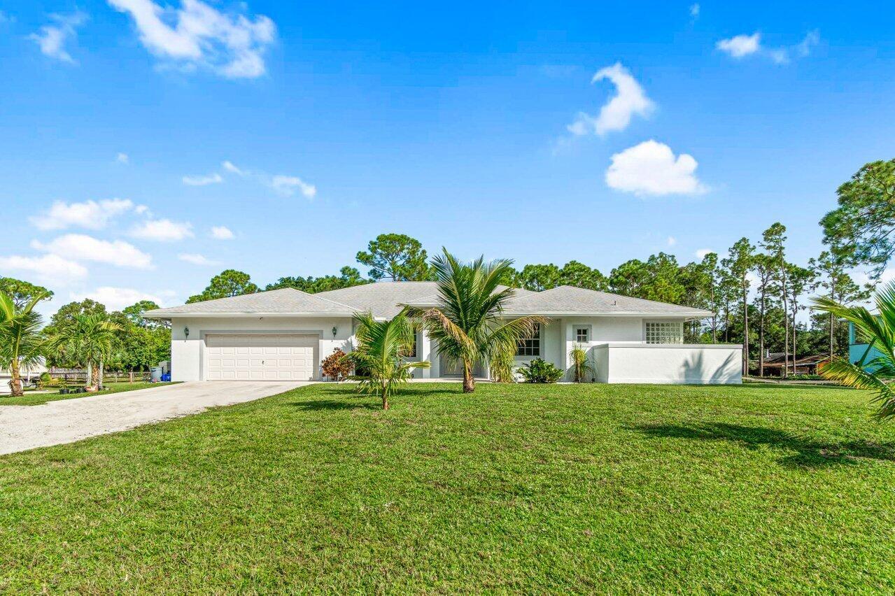 Property Photo:  12725 54th Street N 12725  FL 33411 
