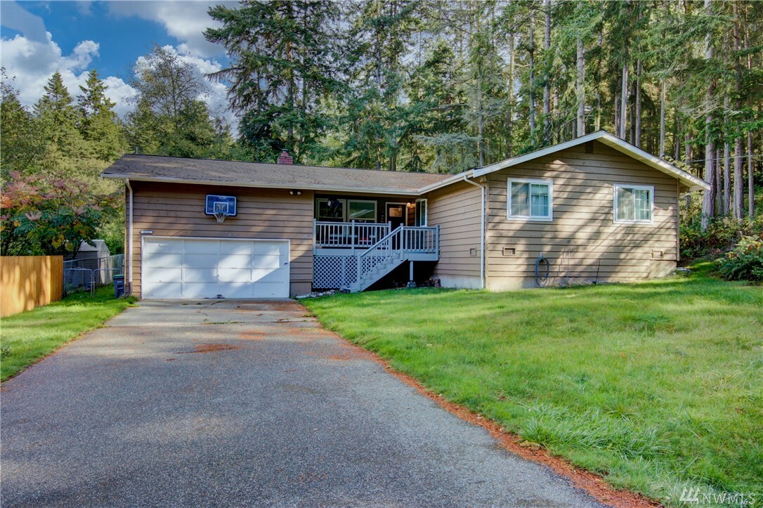 Property Photo:  4566 Woodland Cir  WA 98277 