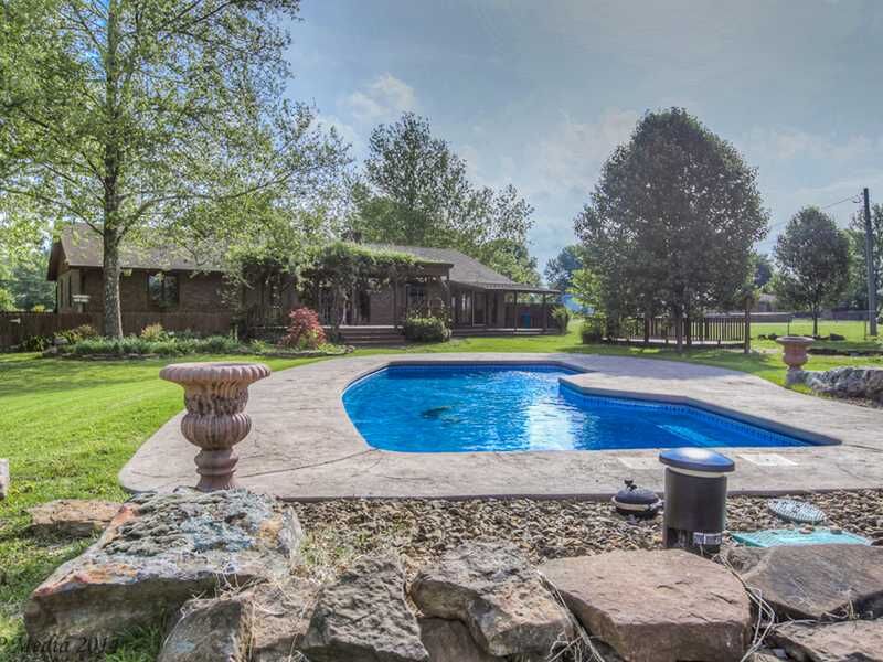 Property Photo:  1902 Mayflower Road  AR 72712 