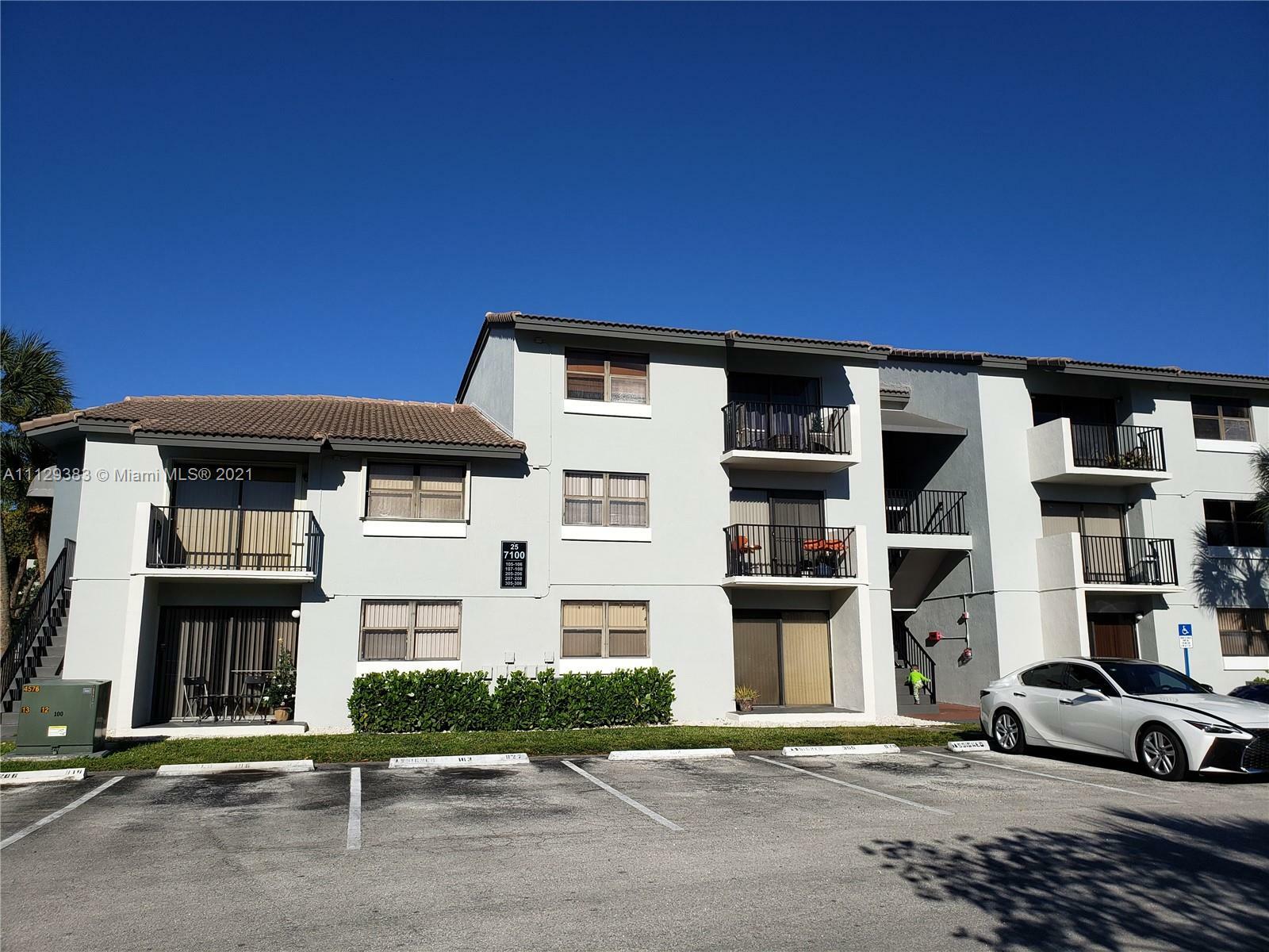 Property Photo:  7100 NW 179th St 208  FL 33015 