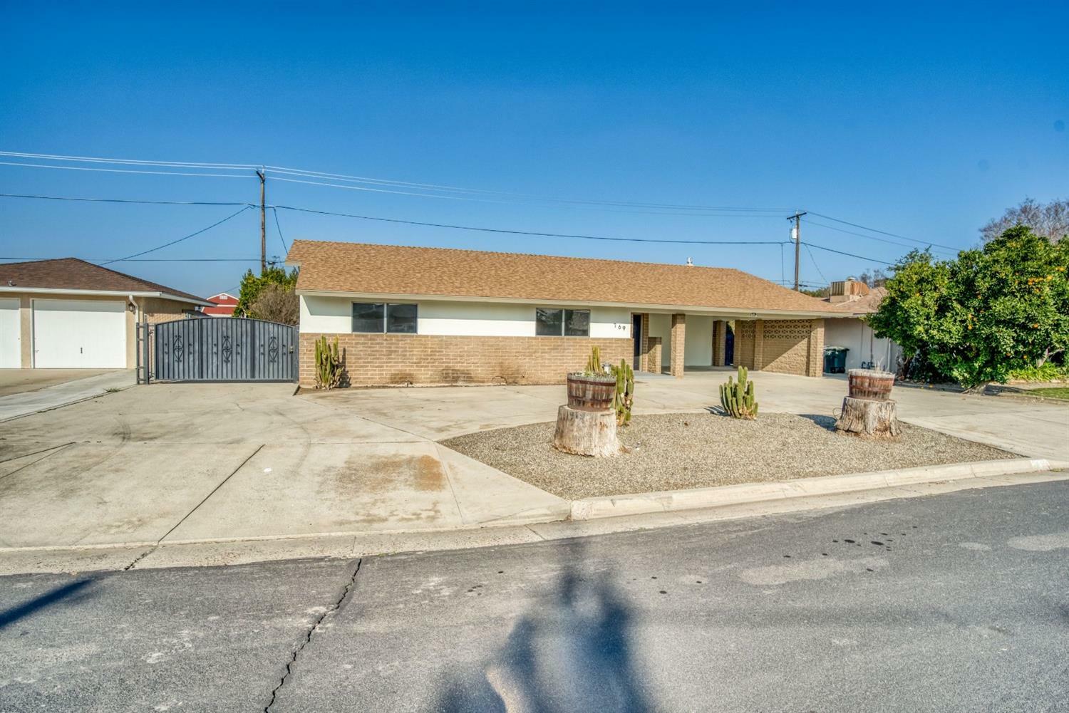 Property Photo:  769 Almond Drive  CA 93612 