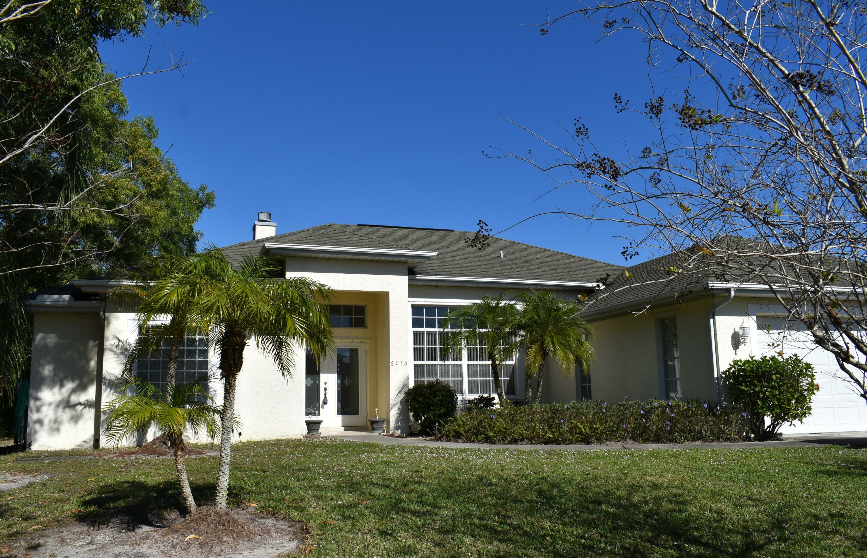 Property Photo:  6718 NW Mamie Court  FL 34983 