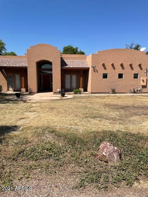 Property Photo:  8816 S 214th Drive  AZ 85326 