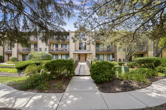 Property Photo: 103 Olesen Drive 1C IL 60540