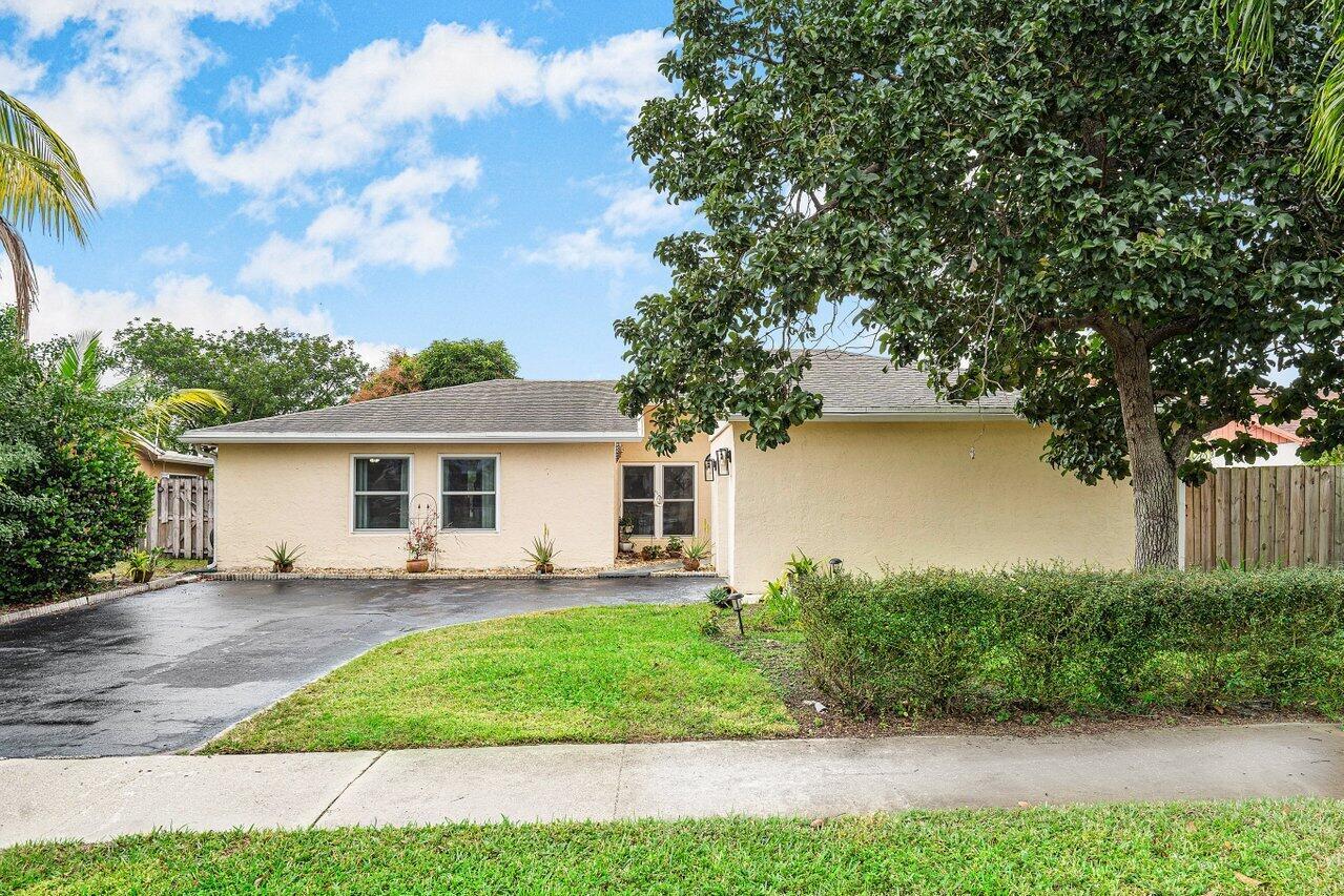 Property Photo:  387 NW 39th Way  FL 33442 