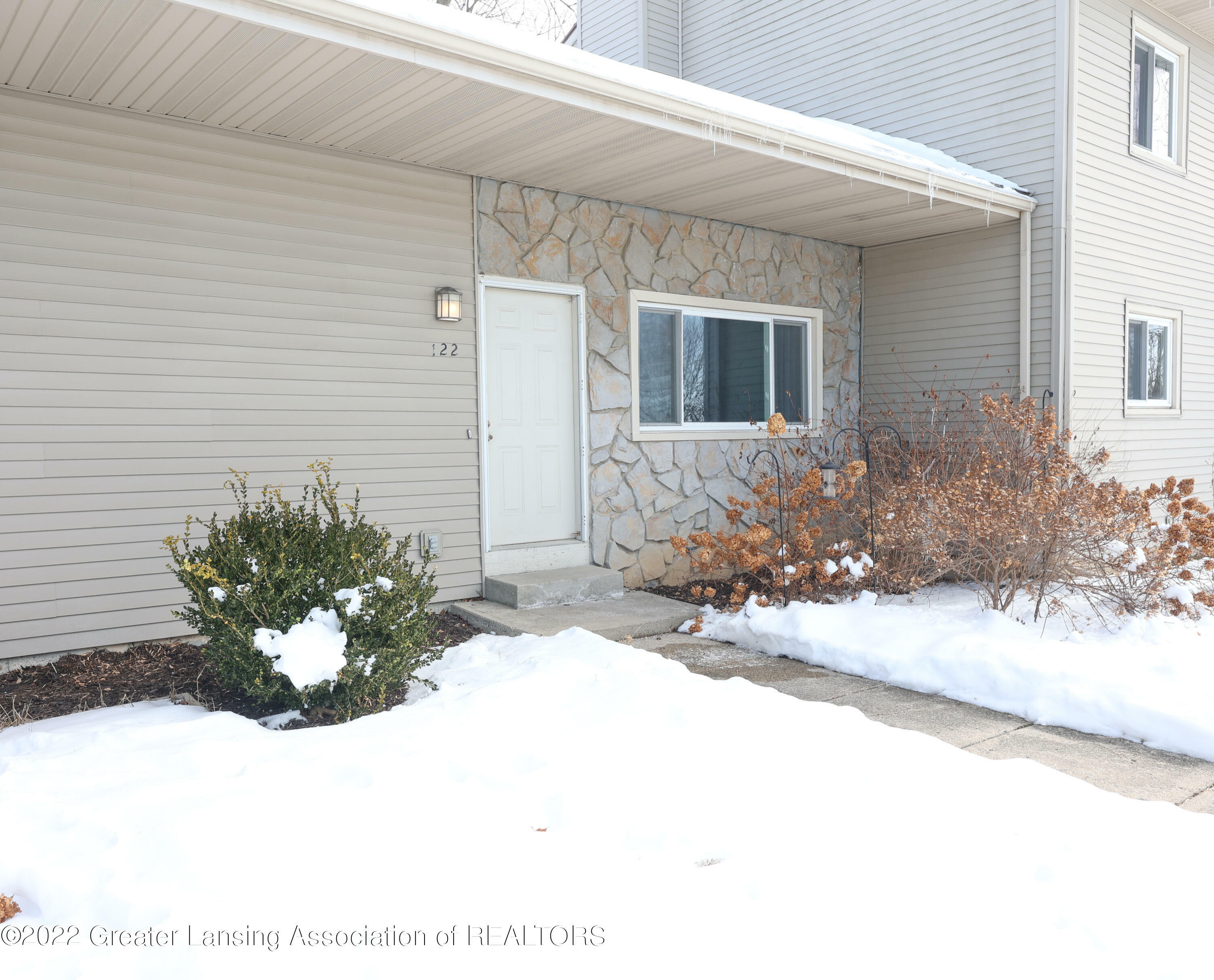 Property Photo:  907 Registry Drive  MI 48837 