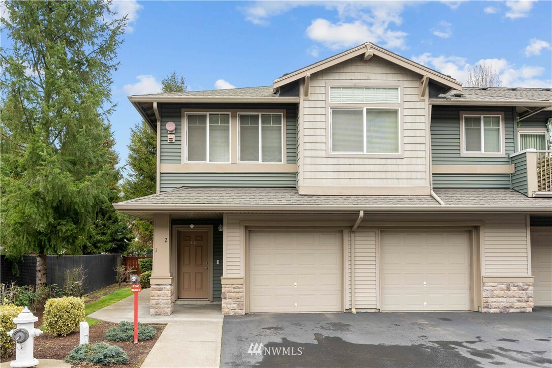 Property Photo:  15325 SE 155th Place C2  WA 98058 