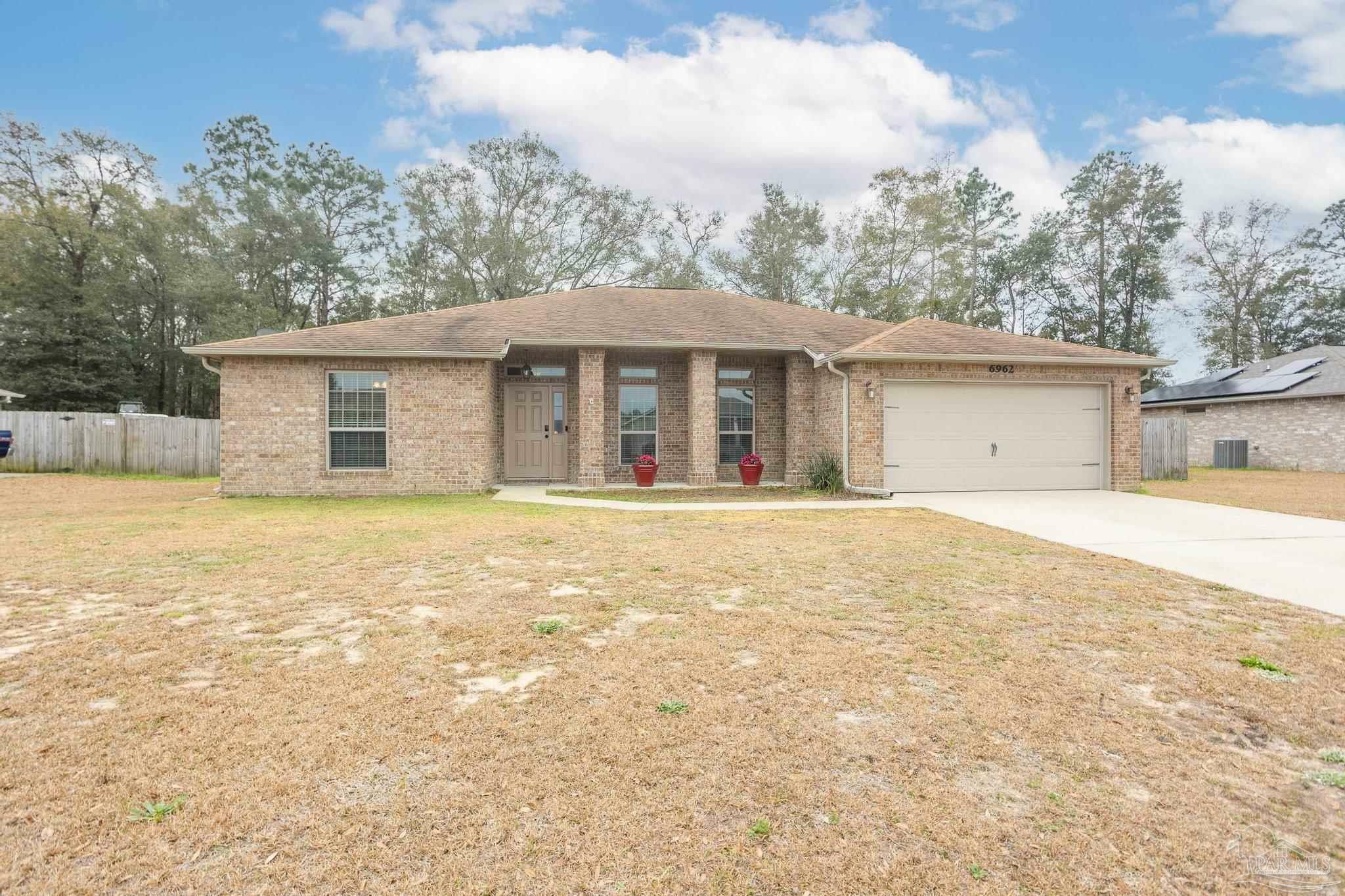 Property Photo:  6962 Harvest Way  FL 32570 