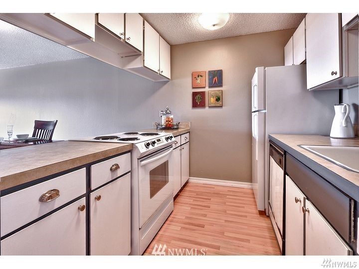 Property Photo:  3601 24th Avenue W 402  WA 98199 