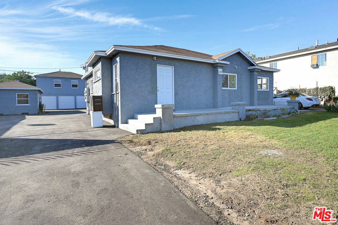 Property Photo: 228 E 119th St CA 90061