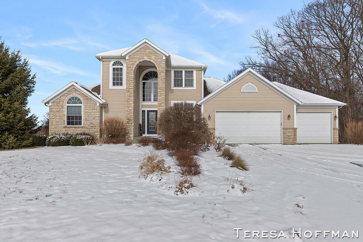 Property Photo:  2525 Recluse Drive NE  MI 49319 