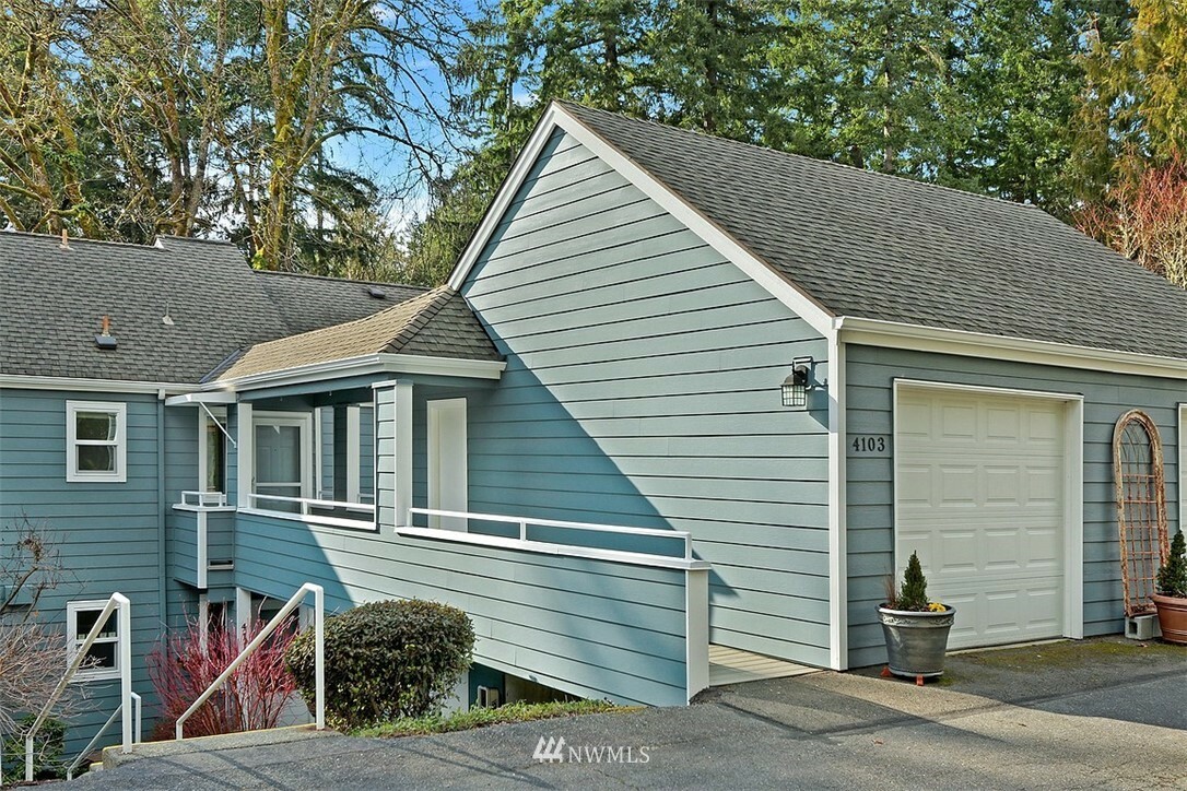 Property Photo:  4103 220th Place SE 2054  WA 98029 