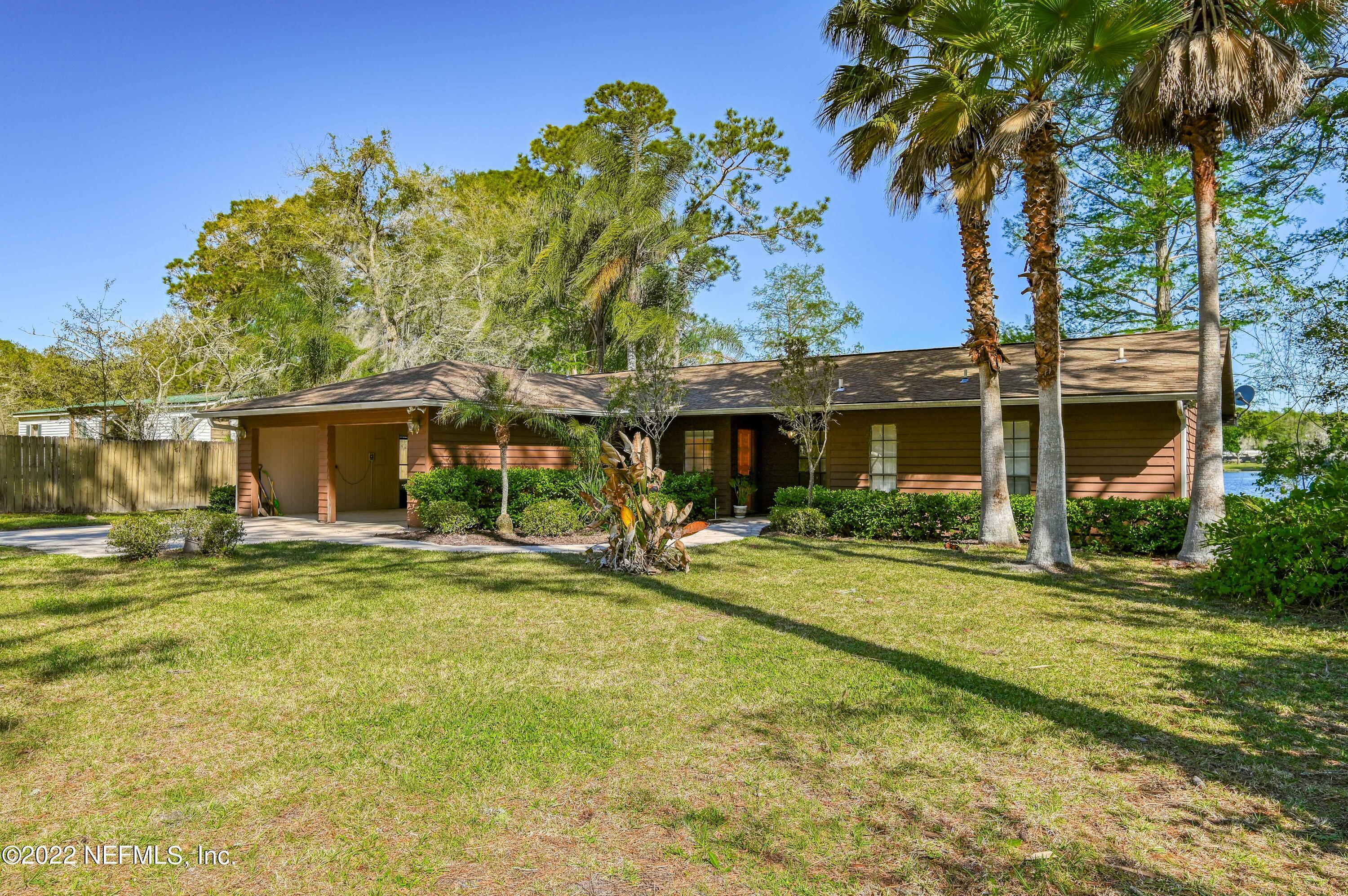 Property Photo:  118 Lake Edge Trail  FL 32148 