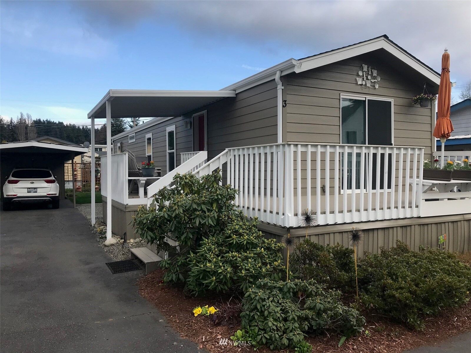 Property Photo:  600 NE Lincoln Road Sp 3  WA 98370 