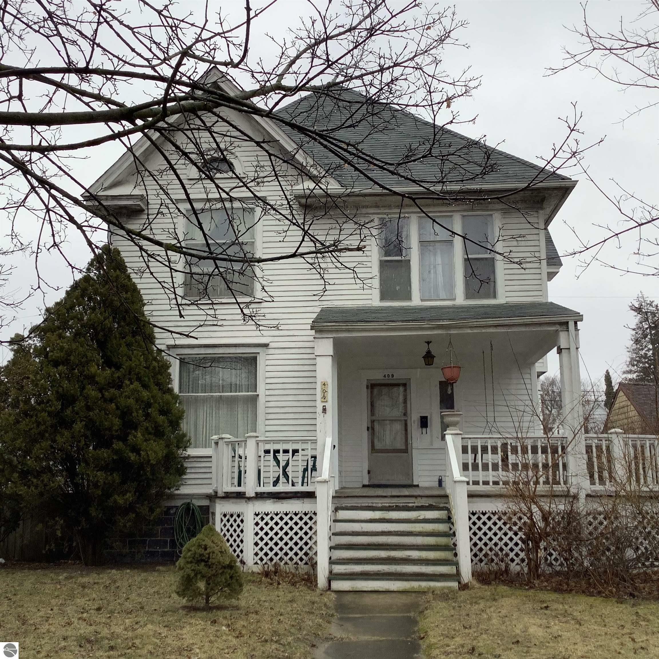 Property Photo:  409 S University Avenue  MI 48858 