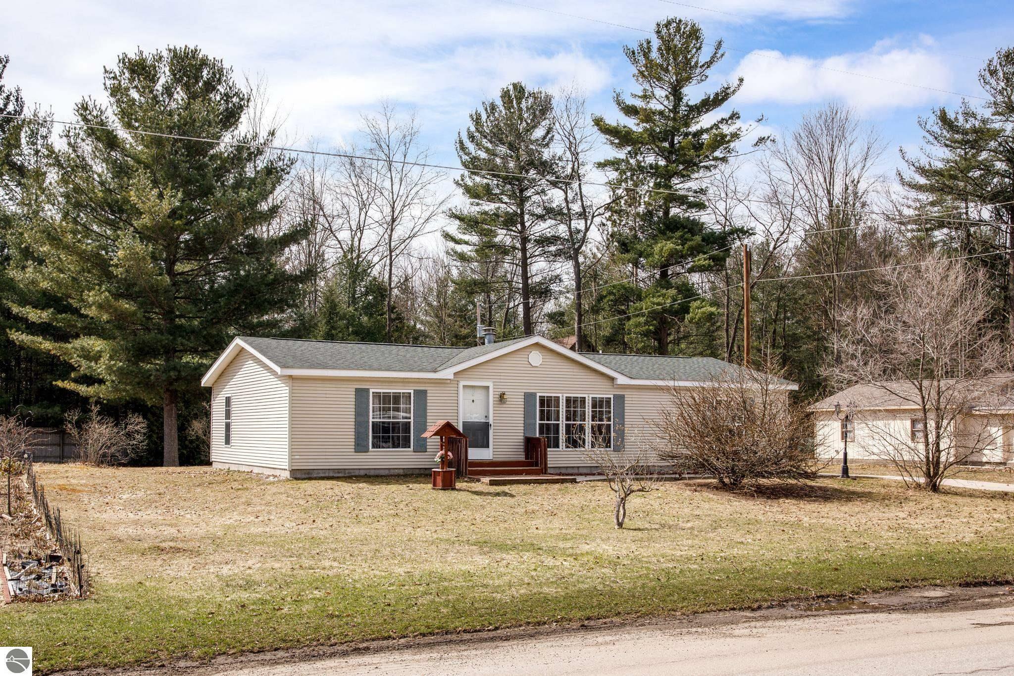 Property Photo:  1858 Pine Drive  MI 49686 