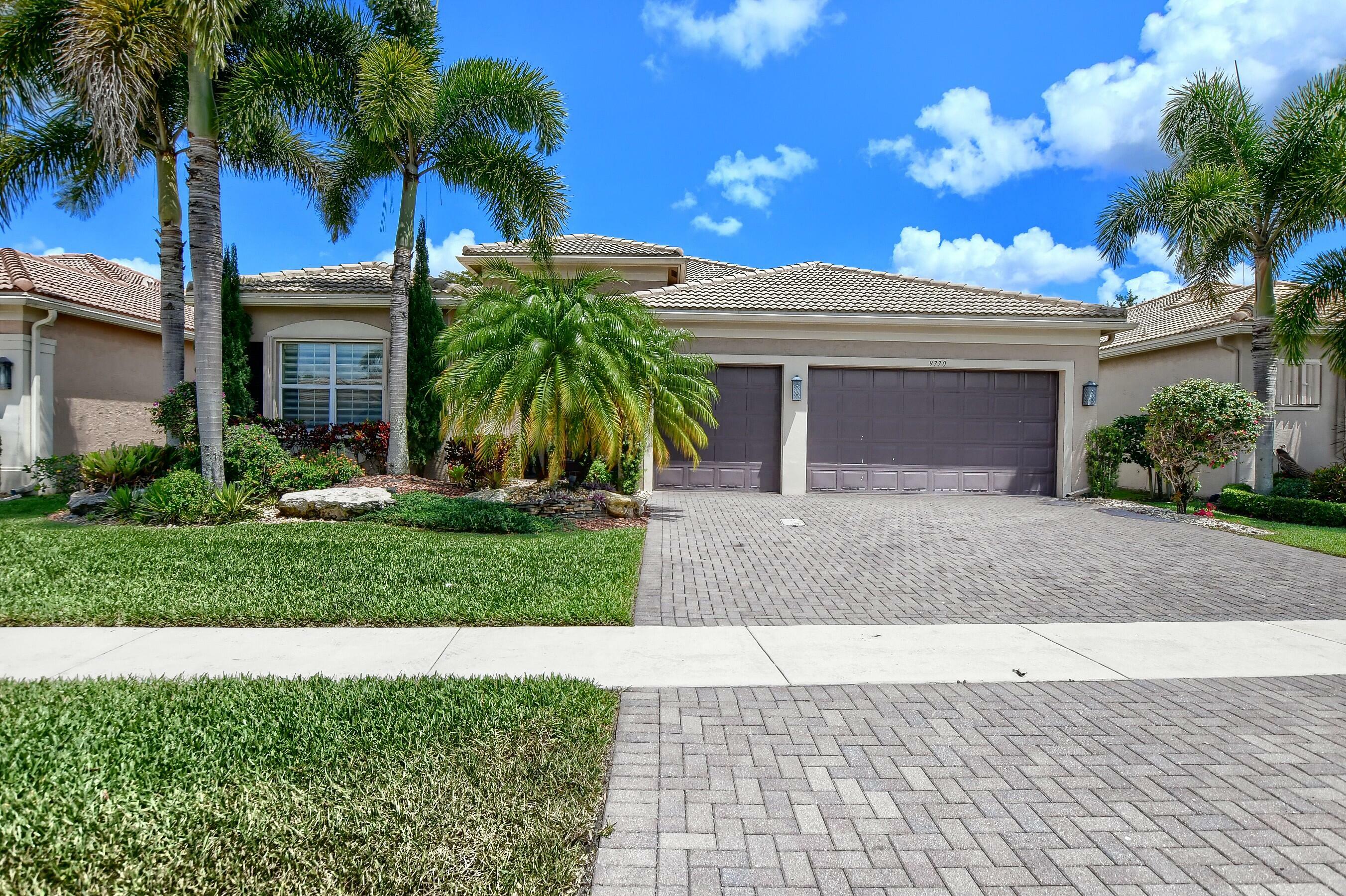 Property Photo: 9770 Dovetree Isle Drive FL 33473