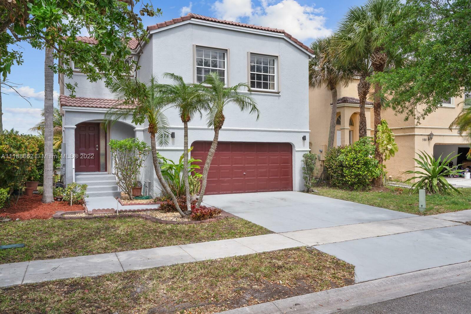 Property Photo:  574 NW 158th Ln  FL 33028 