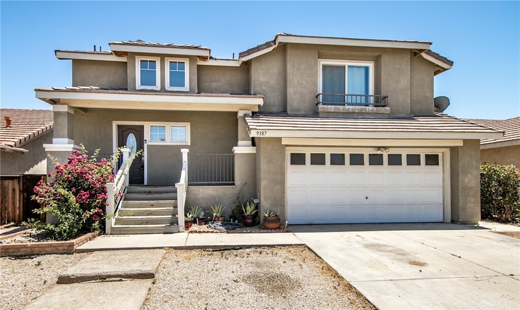 Property Photo:  9387 Nolina Drive  CA 92344 