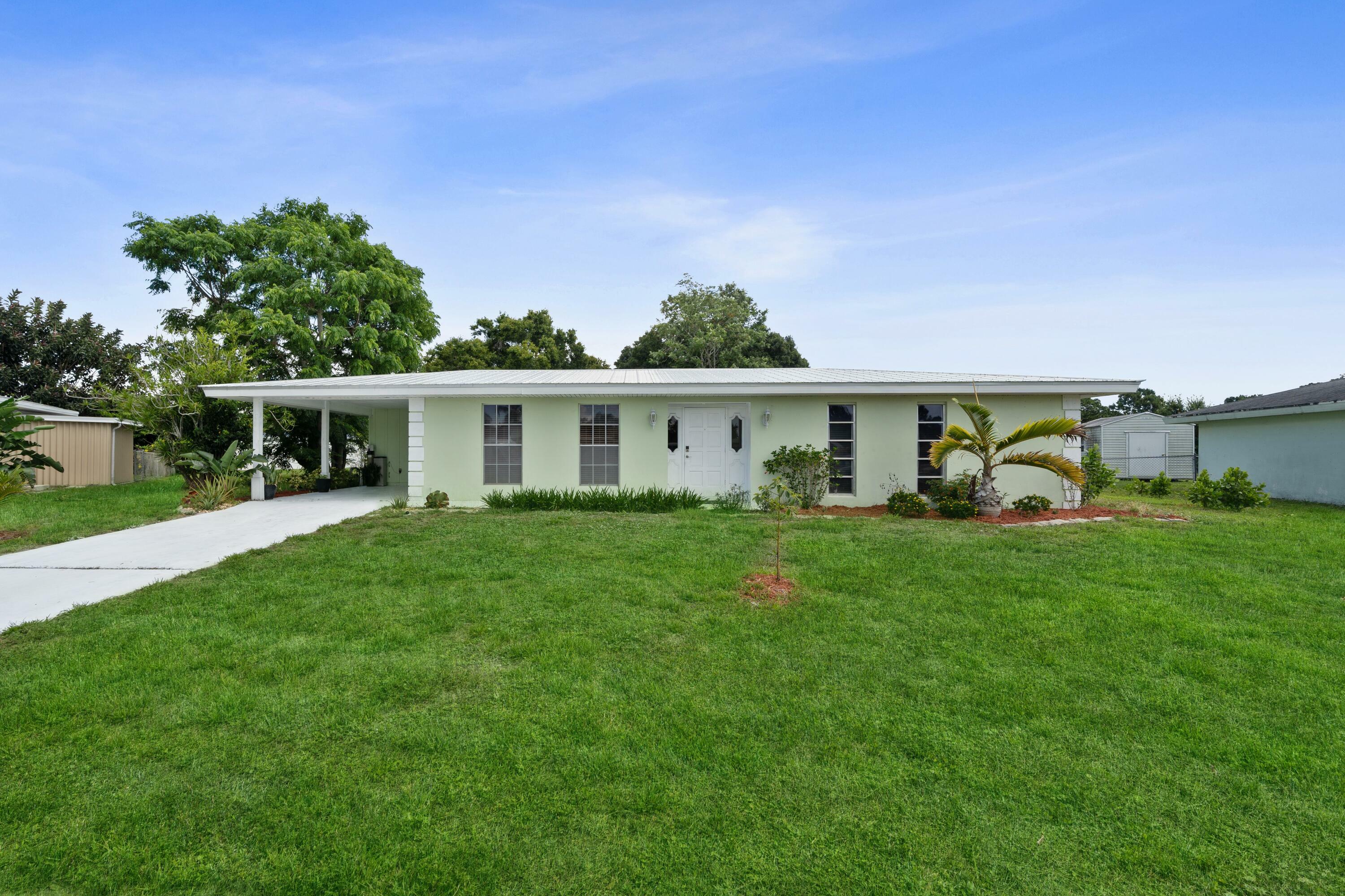 Property Photo:  175 NE Tunison Avenue  FL 34983 