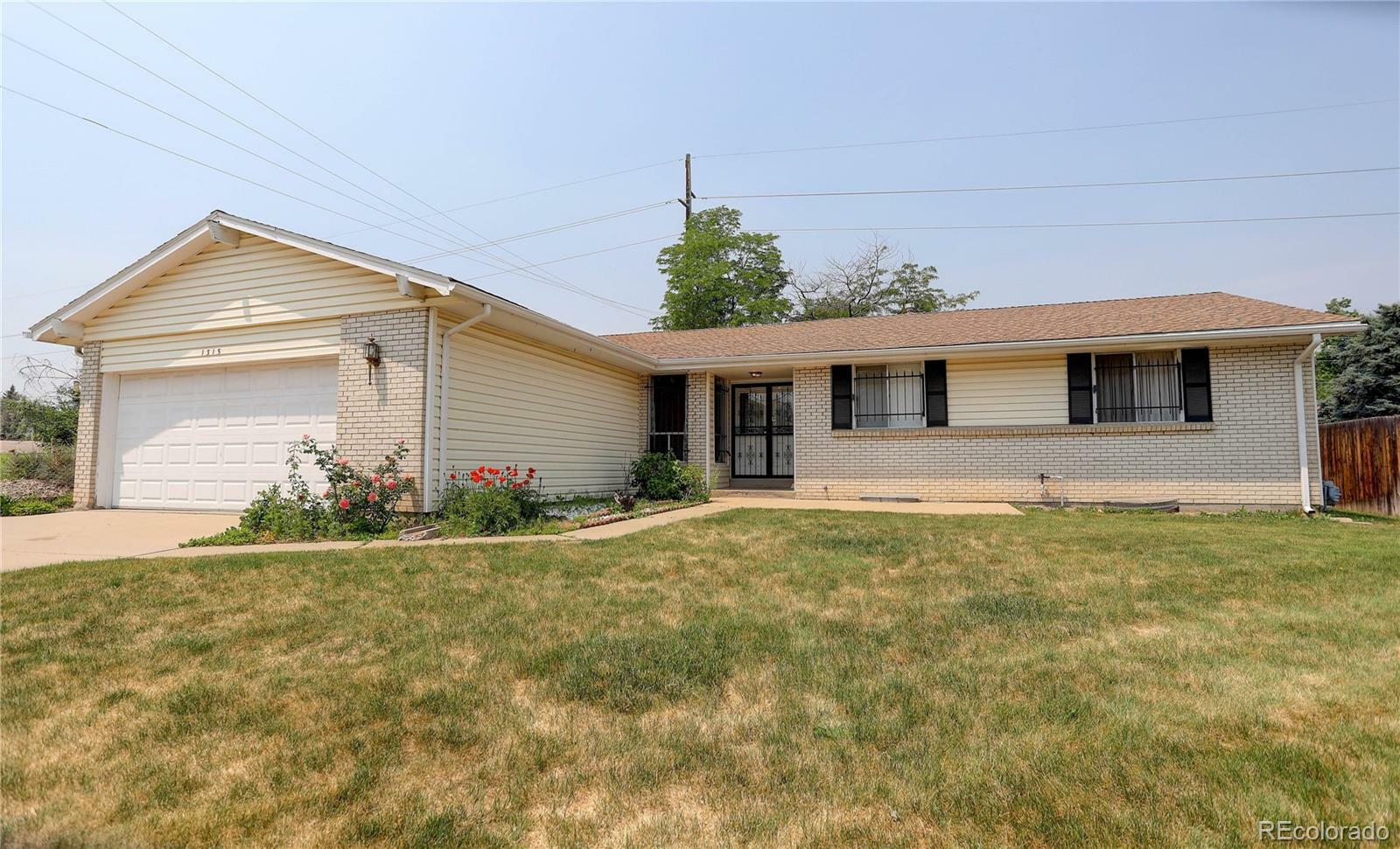 Property Photo:  1315 S Simms Street  CO 80232 