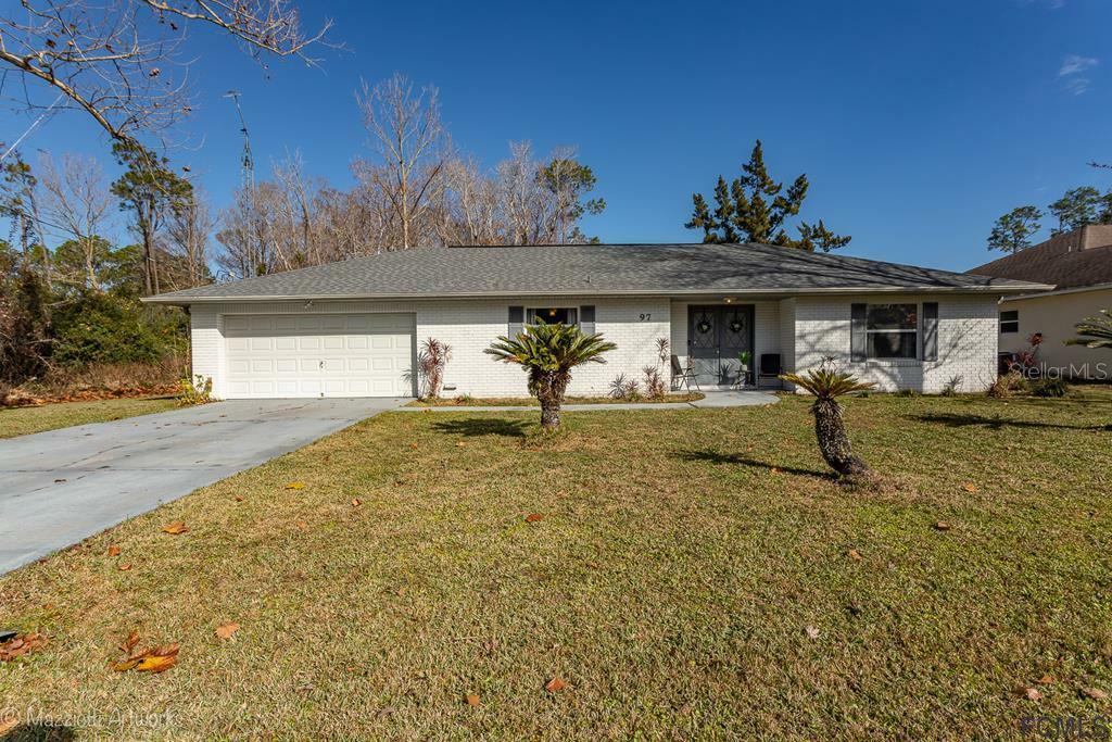 Property Photo:  97 Zephyr Lily Trail  FL 32164 