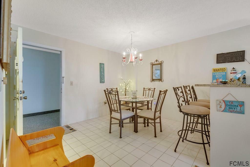 Property Photo:  1415 Ocean Shore Boulevard 107  FL 32176 