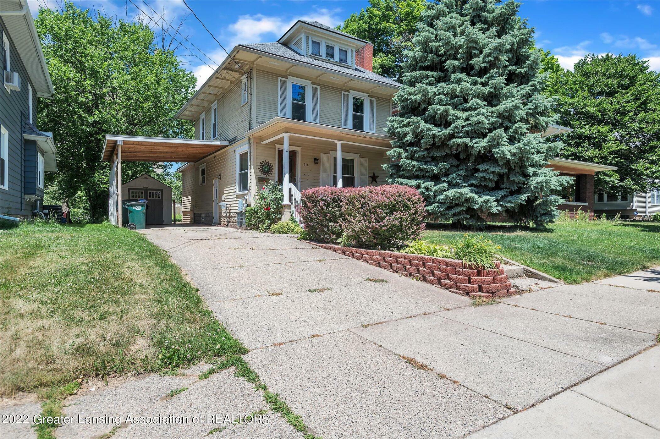 Property Photo:  414 W Barnes Avenue  MI 48910 