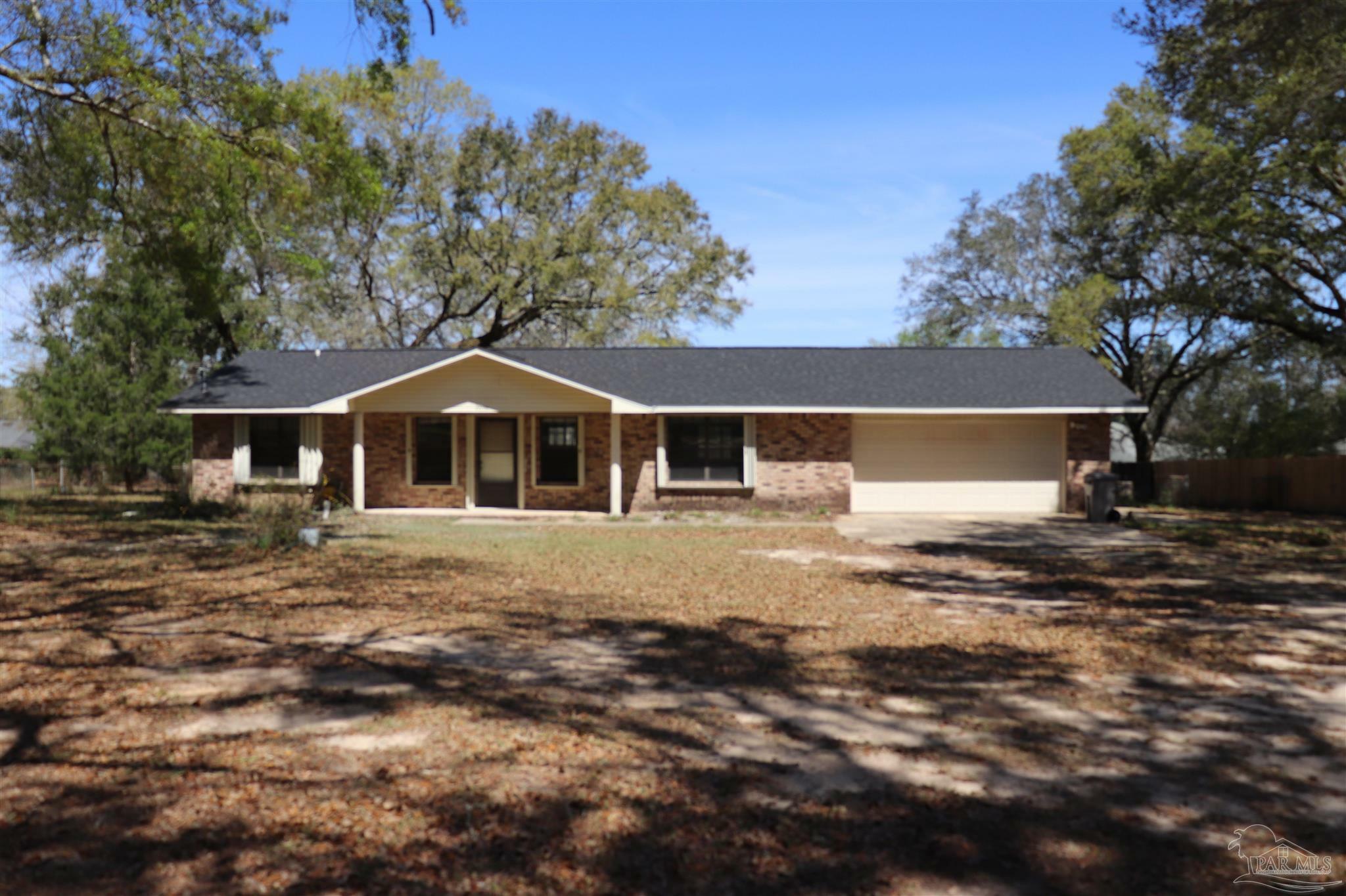 Property Photo:  2098 Old Chemstrand Rd  FL 32533 