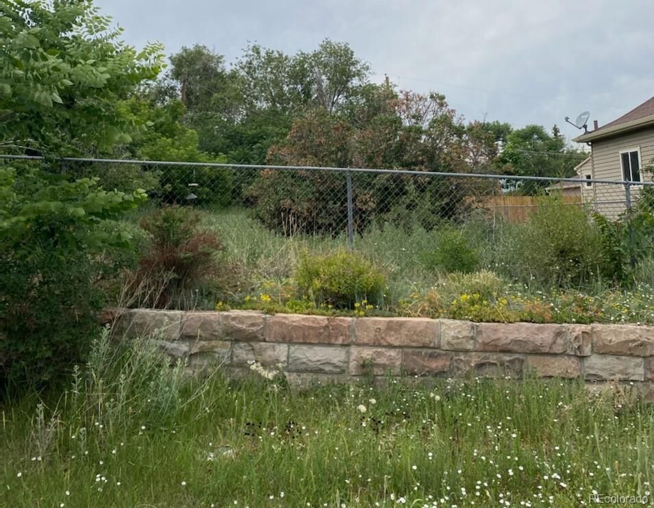 Property Photo:  653 Quitman Street  CO 80204 