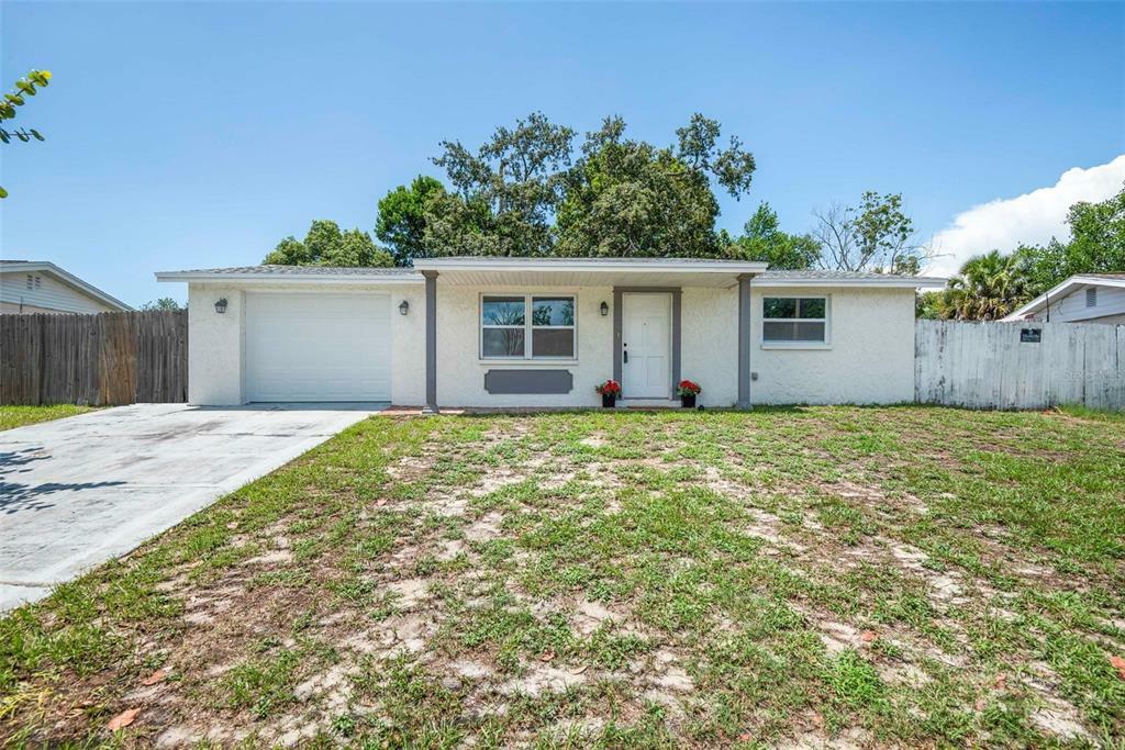 Property Photo:  7805 Treasure Pointe Drive  FL 34668 