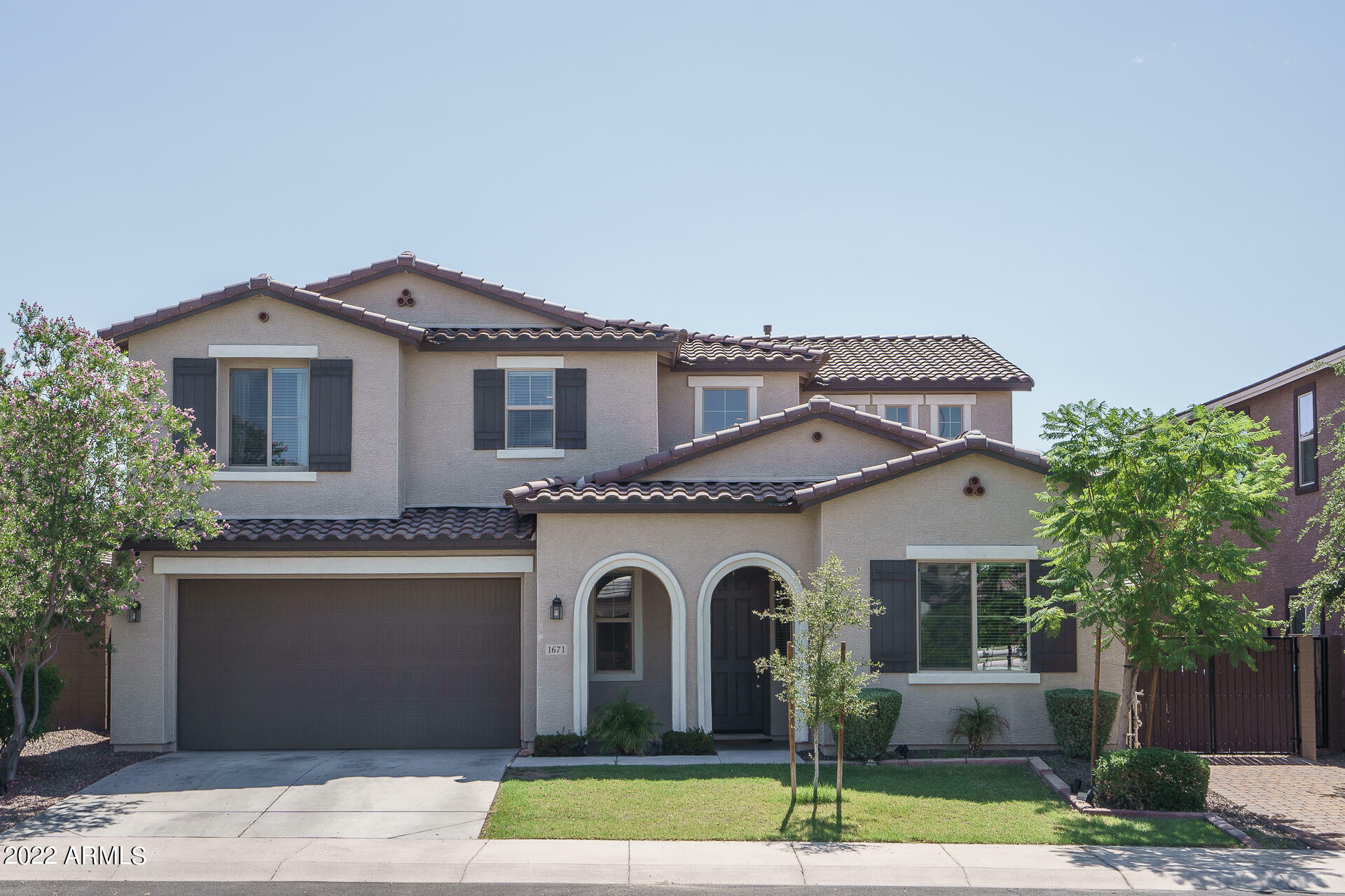 Property Photo: 1671 N 214th Avenue AZ 85396