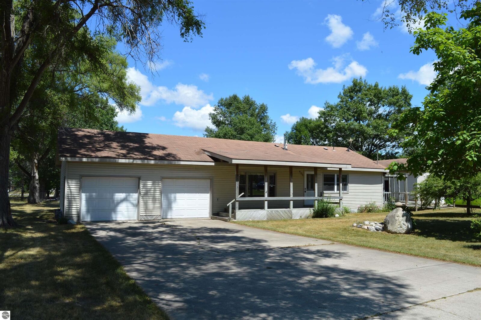 Property Photo:  406 NW Kalkaska Street  MI 49646 
