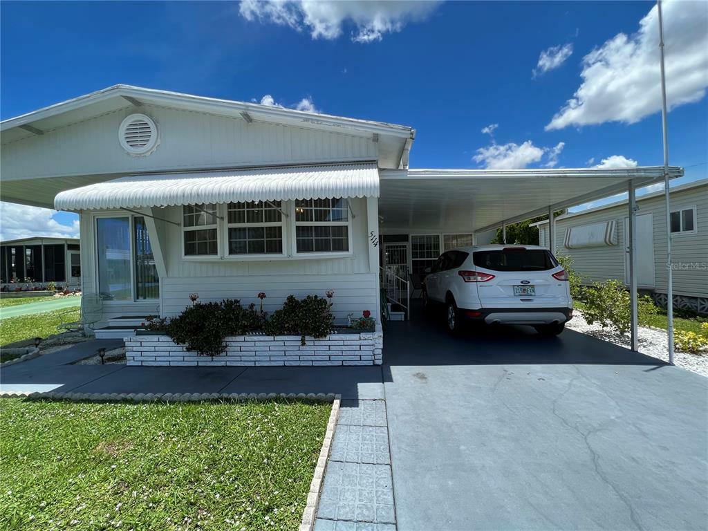 Property Photo:  5114 Rancho Avenue  FL 34234 