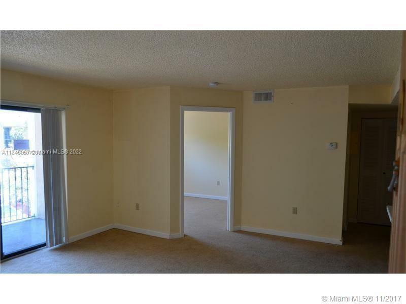 Property Photo:  300 W Palm Cir W 205  FL 33025 