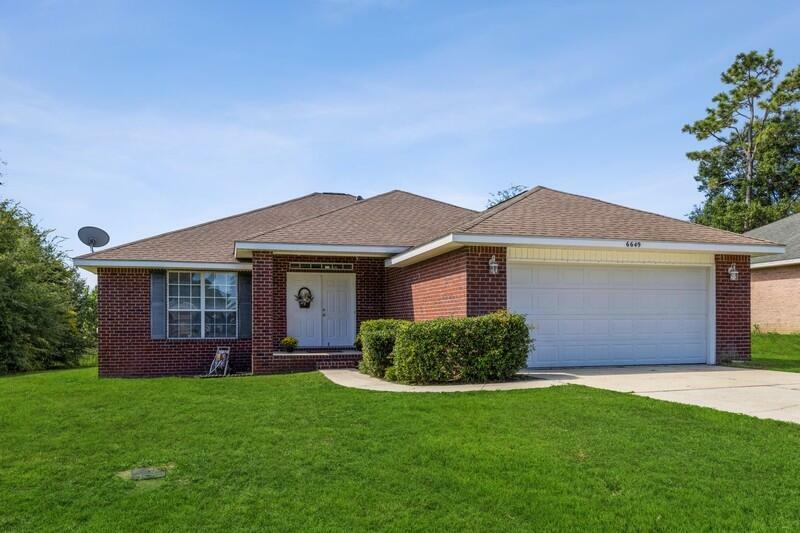 Property Photo: 6649 Woodbury Forest Drive FL 32583