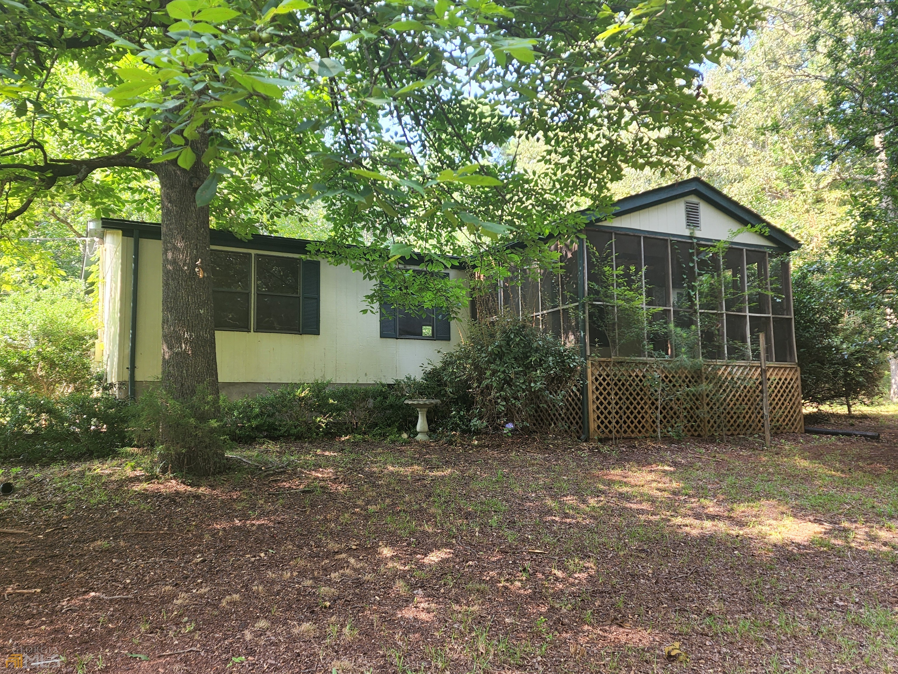 Property Photo:  127 Collins Road  GA 30233 